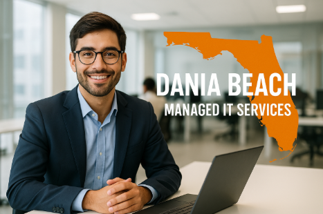 Smiling IT professional in modern office with orange Florida silhouette and bold text promoting Managed IT Services in Dania Beach, Florida.