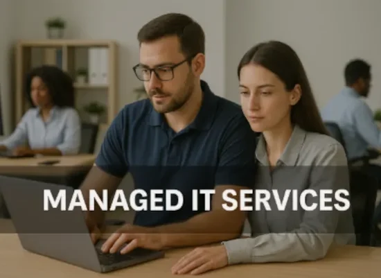 Managed IT support team working on devices for a business in Southside Jacksonville.