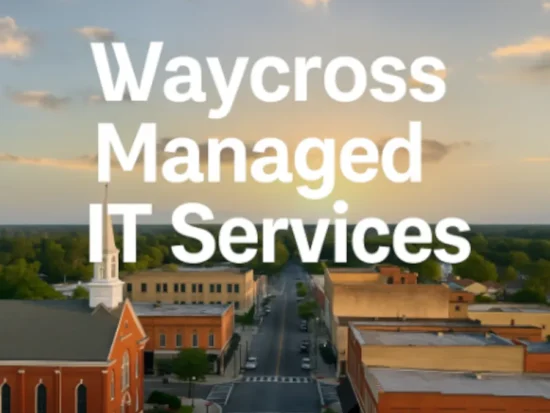 Aerial view of downtown Waycross, Georgia at sunset with “Waycross Managed IT Services” text overlayed.