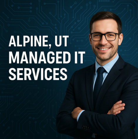 IT professionals collaborating in an Alpine, Utah office with mountain views, focusing on managed IT services and teamwork.
